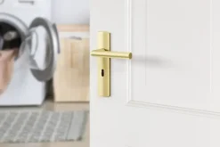 AXA deurkrukset Curve Milan goud blindschild klaviersleutel