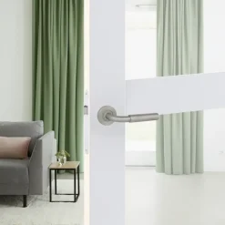 Karwei deurkruk set Roy rond rozet RVS